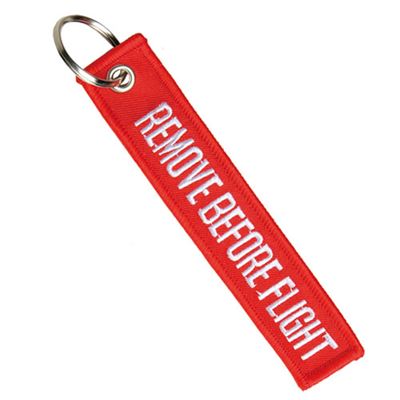 Brelok „REMOVE BEFORE FLIGHT” CZERWONY