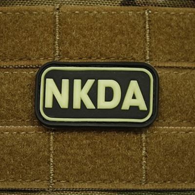 Plastikowa naszywka KREV NKDA świecąca w ciemności